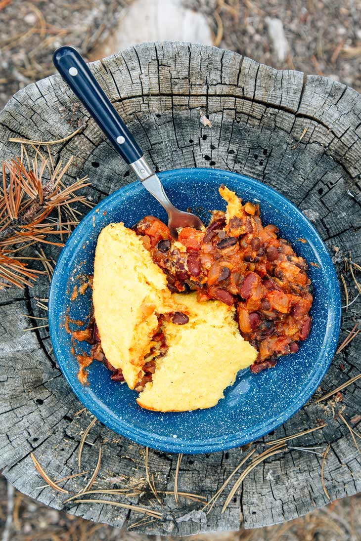 Dutch oven chili and cornbread in a bowl