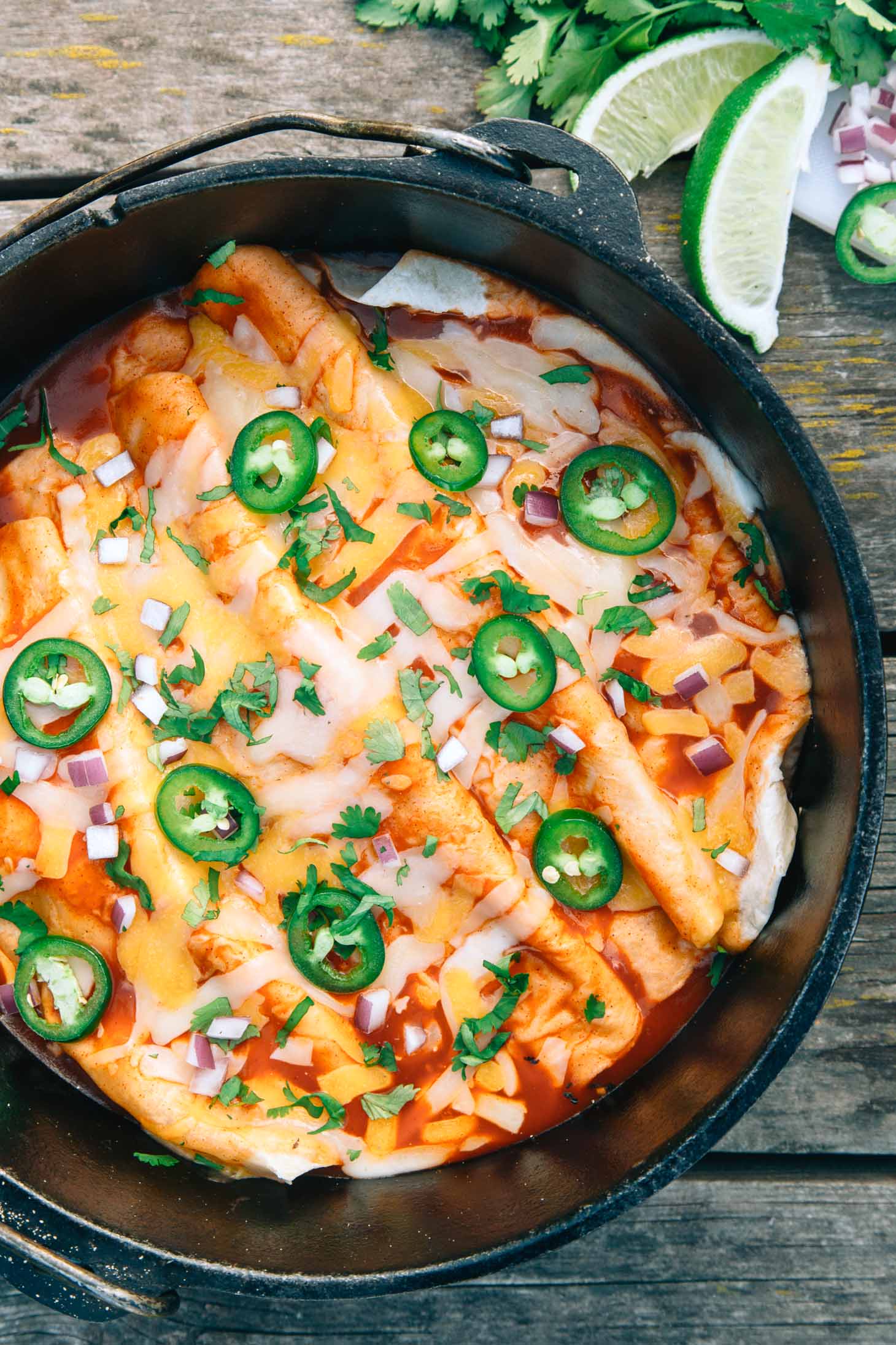 Enchiladas in a dutch oven on a table