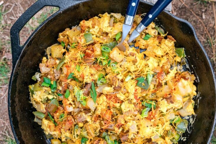 Mountain skillet topped with scallions and hot sauce