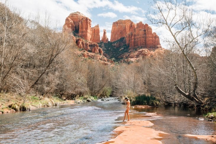 Megan putting her foot in the water at red rock Creek