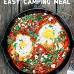 Pinterest graphic with text overlay reading "Shakshuka easy camping meal"