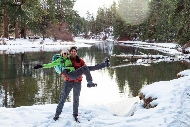 Megan and Michael in their winter hiking gear cheesing for the camera